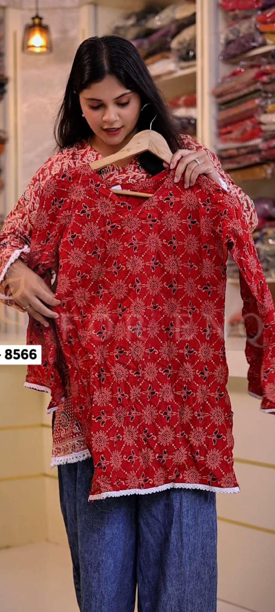 8566