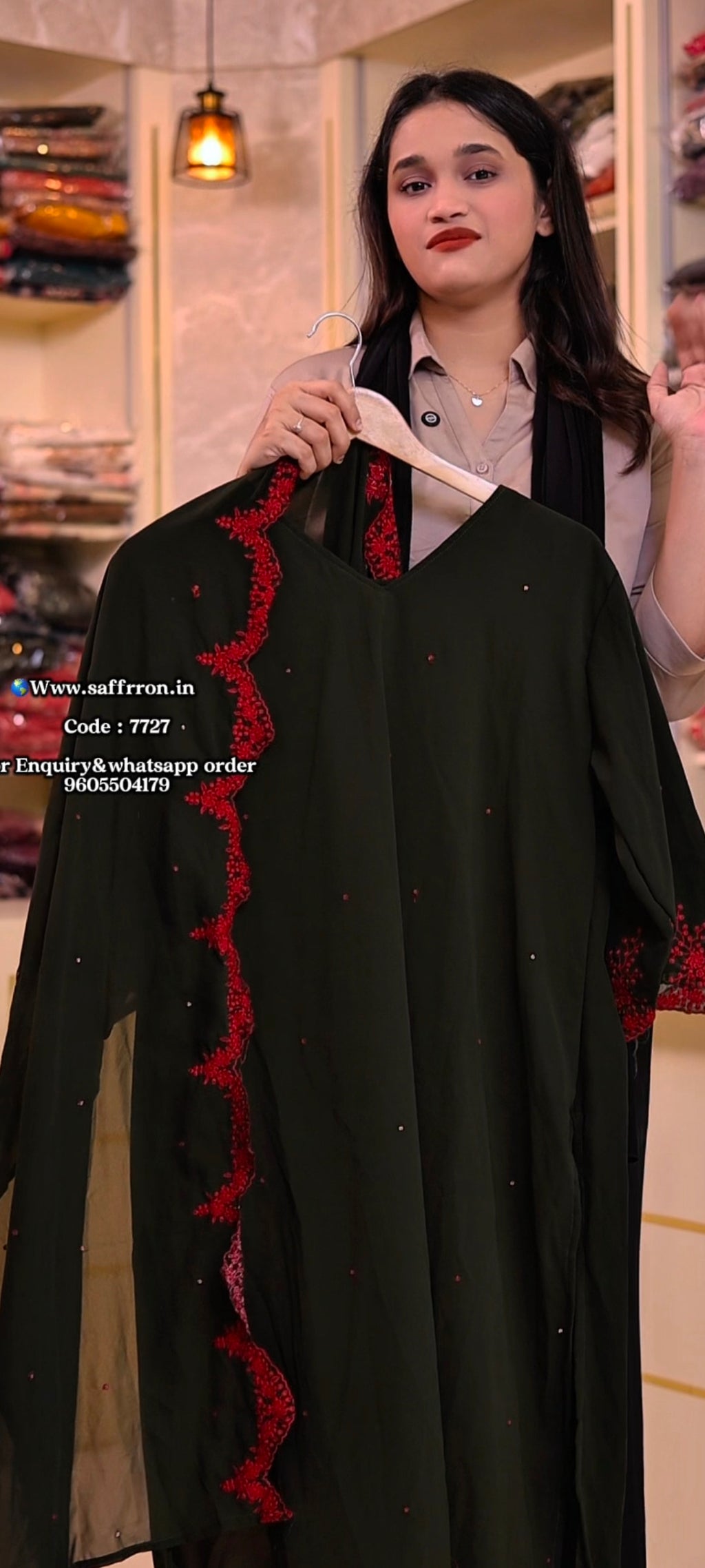 7727