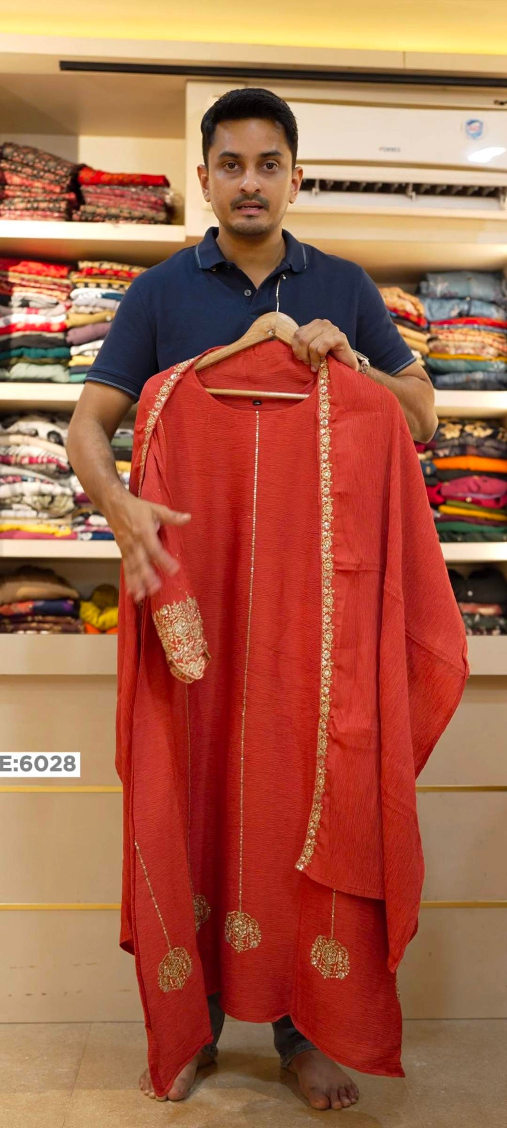 6028