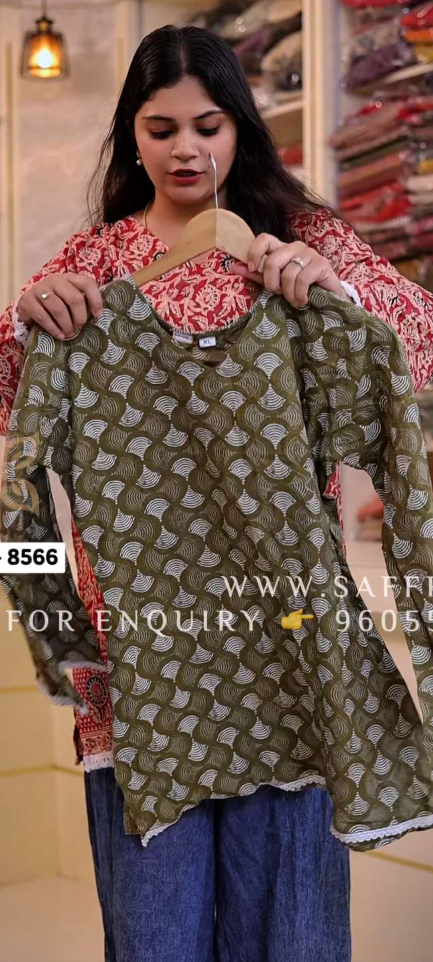 8566